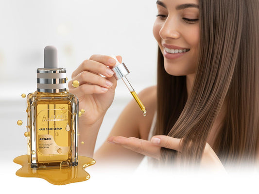 Argan yağı saç bakımı nasıl yapılır gösteren, saçına argan yağı damlatan gülümseyen kadın