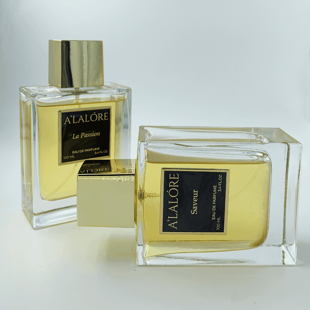 Alalore unisex parfüm 100 ml şeffaf cam şişede altın kapaklı modern tasarım